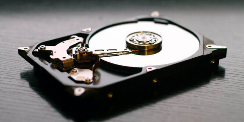 Close up of the inside of a hard disk drive used to store raw files and video footage